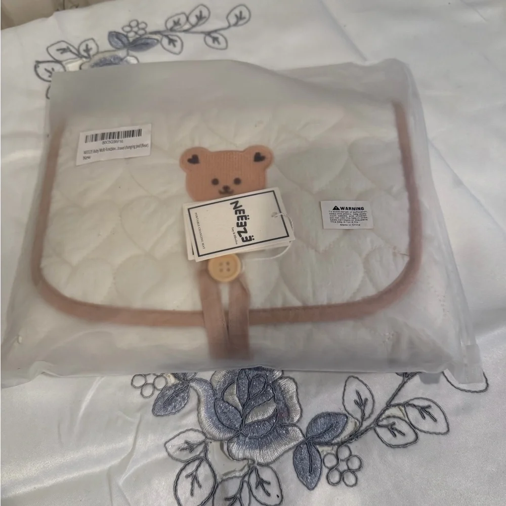 Neutral Cream Quilted Diaper Clutch with Brown Trim and Bear Accent